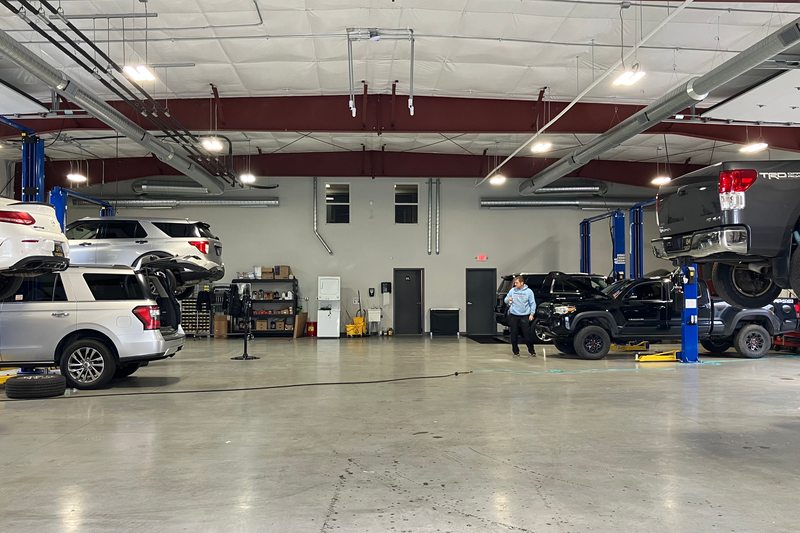 The real vehicle lifts and workshop at Levant Motors