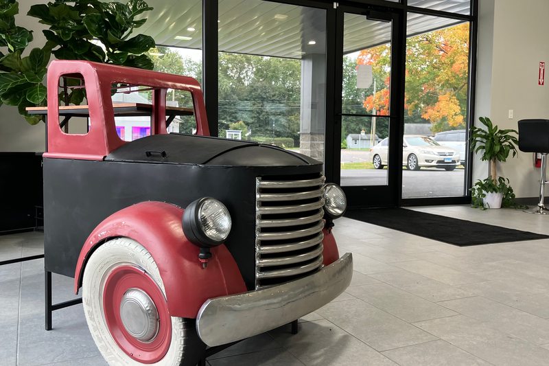 Vintage truck-inspired furniture inside the East Windsor showroom